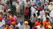 AAP's Sukhpal Singh Khaira addresses a gathering after his roadshow reached Dhilwan Village