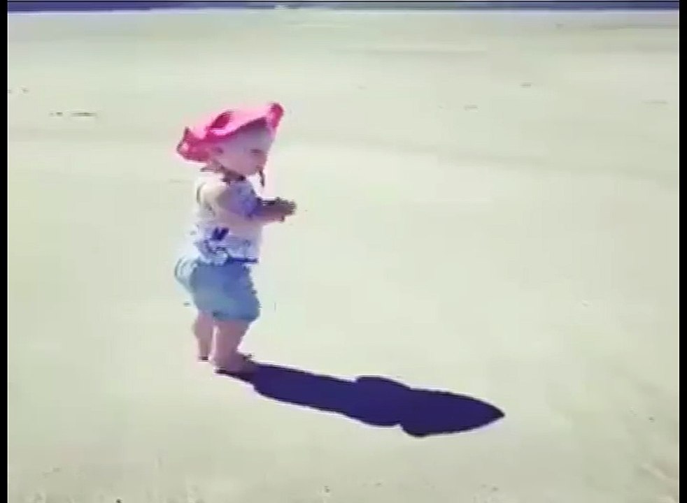 Child Playing With His Shadow