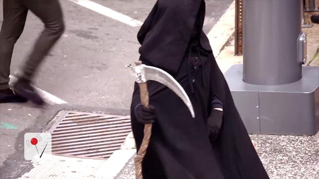 'Grim Reaper' Warns Of Texting While Walking in One Big City