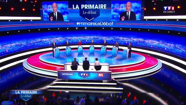 Débat des primaires : premiers échanges entre Juppé et Sarkozy