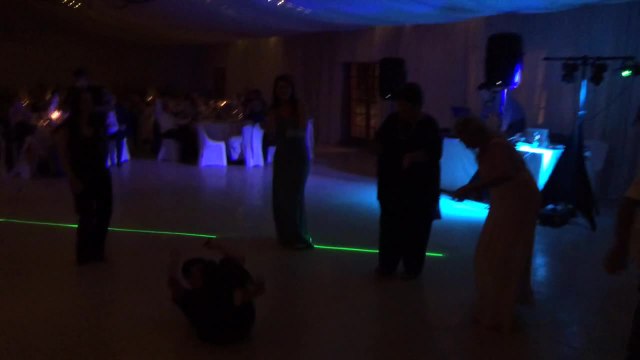 Elderly woman drops epic dance move, crowd goes nuts