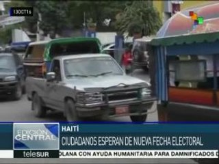 Haitianos en espera de conocer la nueva fecha de las presidenciales