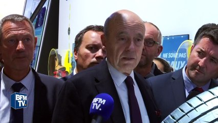 En visite au Salon de l'automobile, Alain Juppé vante le dialogue social en entreprise