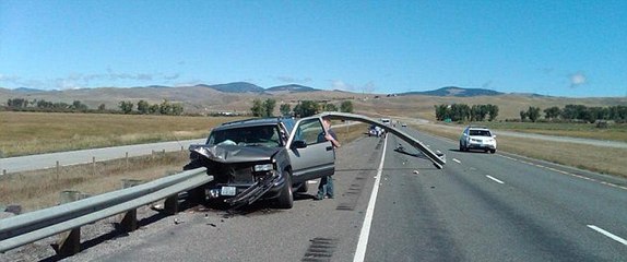 Car Tries to Pass Up Bus and Crashes