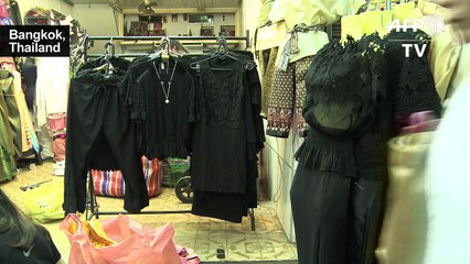 As Thais mourn king, black clothing booms