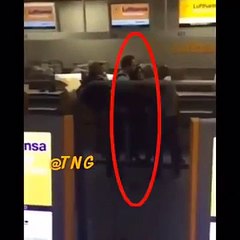 German Security man electric shocks a women for refusing to take her hijab off, only to learn a lesson from her husband