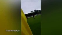 Football referee seriously injured after bystander runs onto pitch and spear tackles him to ground..