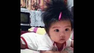 SO cute! These 11 adorable babies have crazy, long hair.