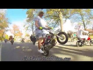 Motorcyclist Performs Wheelies on a 50CC Pit Bike in Grandma Outfit