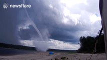 Incredible waterspout swirling on river in Russia