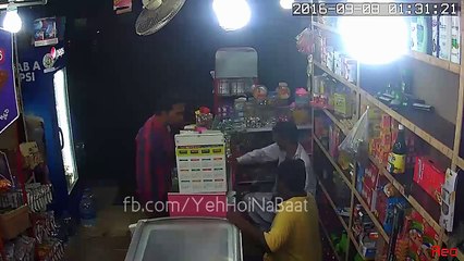 CCTV Footage - Watch How A Shopkeeper Save His Shop From Robbers in Karachi