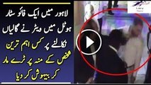 A Waiter slashes tray on customer's face in Lahore