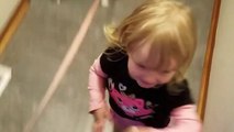 Excited toddler affectionately hugs everyone