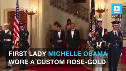 Michelle Obama slays final state dinner with rose gold Versace dress