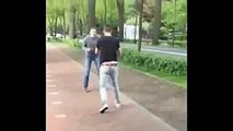 Girl on bike runs into guys fighting funny clip