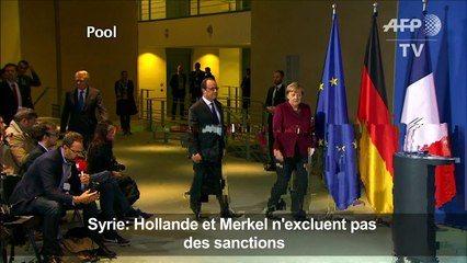 Syrie: Hollande et Merkel n'excluent pas des sanctions