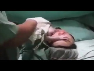 Her Baby's Cry Brings Her Back From Death