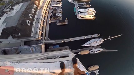 Ce dingue saute d'un immeuble de 40 mètres de haut pour atterrir dans un port.