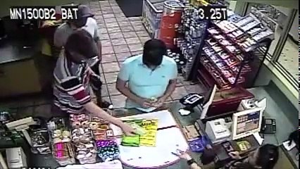 Raw Video: Men Place Card Skimmer on ATM Store Machine!