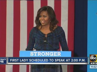 Lines forming as public waits for Michelle Obama to speak