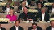 Separated by a cardinal, Trump and Clinton sit down to dinner