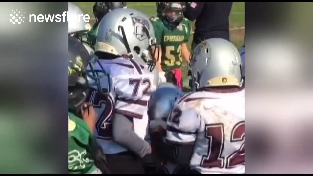 Twins, 6, with Down syndrome score touchdown in American football game