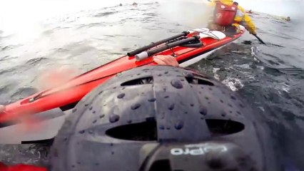 Powerful wave hits kayaker prompting emergency rescue