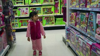 Girl Looking At Toys