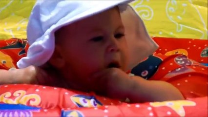 7 month old baby swimming underwater