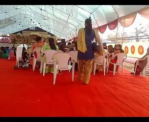 woman falls through chair