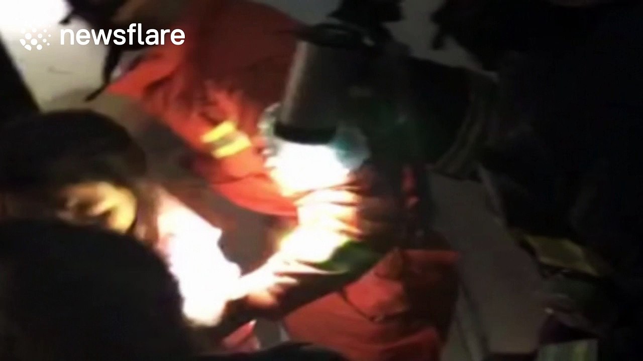 Two workers on tricycle break through elevator door and fall down shaft