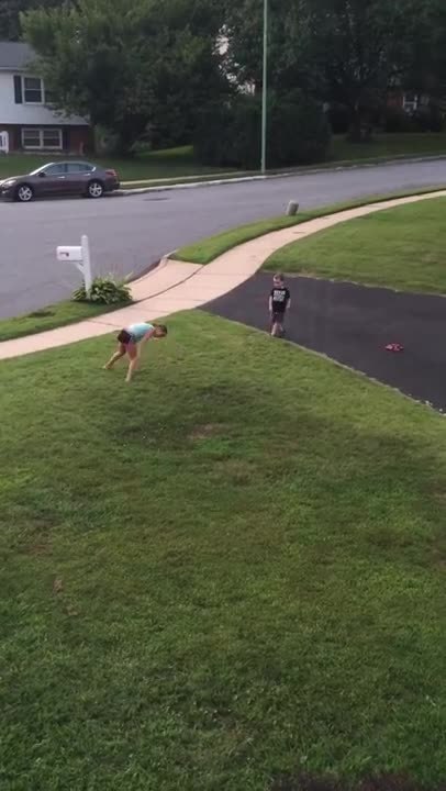 Little boy attempts cartwheels, fails miserably