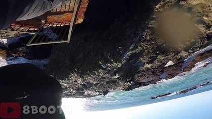 8Booth saute de 10 mètres entre les rochers