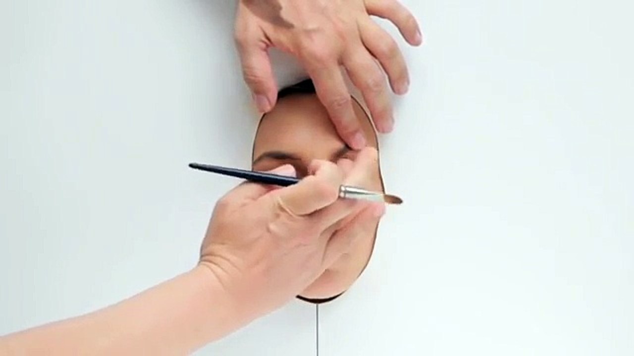Watch 365 layers of makeup applied in one day in 'Natural Beauty' by Lernert & Sander