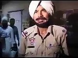 Watch How a drunken Punjab Police Cop giving threat on the name of BADAL when he caught drinking Publicly.