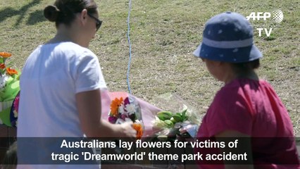 Australians lay flowers for victims of theme park accident