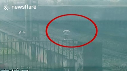 Students wait for train on railway and runs away right on time