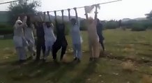 LiveLeak - Only in Pakistan can electricity wires be used as entertainment....