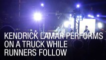 Kendrick Lamar Performs on a Truck While Runners Follow