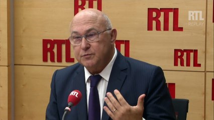"Il faut s'habituer à  moins de croissance pour créer plus d'emploi", se défend Michel Sapin