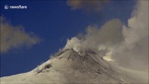 Snow-covered volcano starts steaming