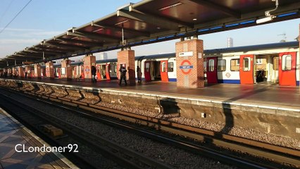 London Underground and c2c trains at West Ham station