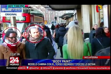 Inglaterra: bella modelo pasea por las calles de Londres en topless