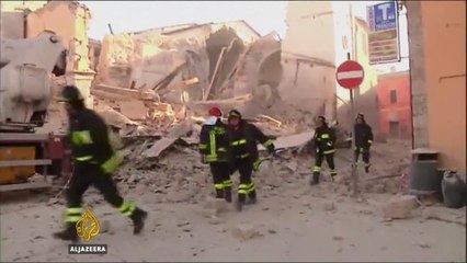 Earthquake brings down buildings in central Italy