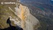 Thrilling point of view footage of wingsuit BASE jump