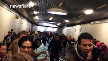 Heavy rain causes flooding in tunnel at Colombian bus station