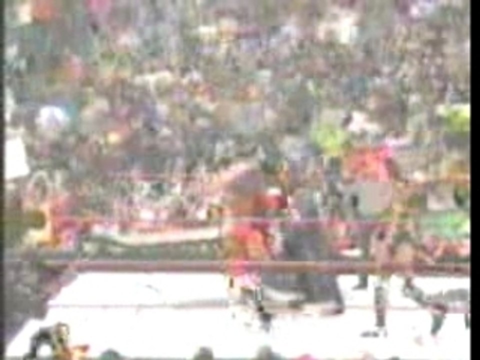 Kane & Taker Give A Double Chokeslam On Hhh Through A Table