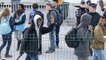 French authorities remove minors from shipping containers in Calais