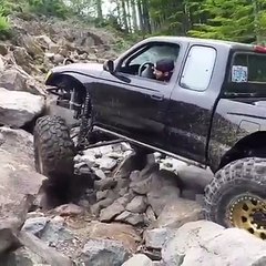 Nice Toyota playing around on the rocks.