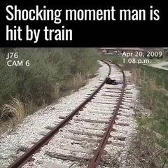 Shocking moment man is hit by train
